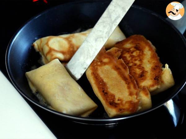 Pannkakor fyllda med béchamelsås, ost och skinka - Beredning steg 10