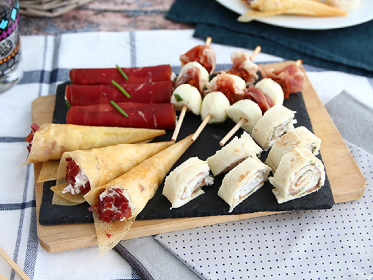 Kvartett av aperitifer med torkat kött